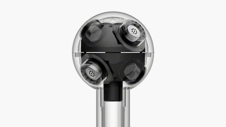 Sony cutaway illustration showing the ECM-AX10 tetrahedral arrangement of four microphone capsules inside its spherical housing.
